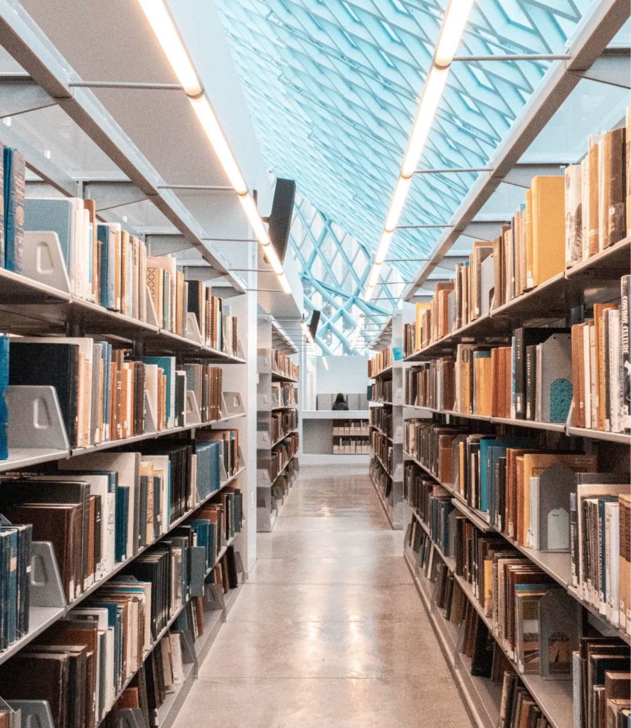 Books on shelves in a library.